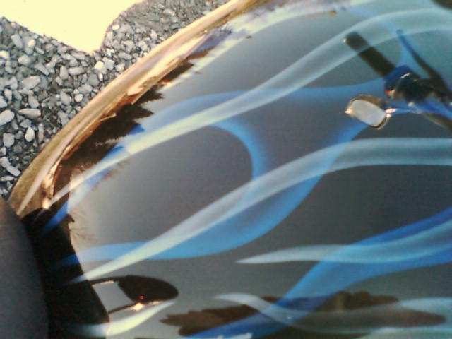 This bike was painted with black basecoat then blue pearl ghost flames and